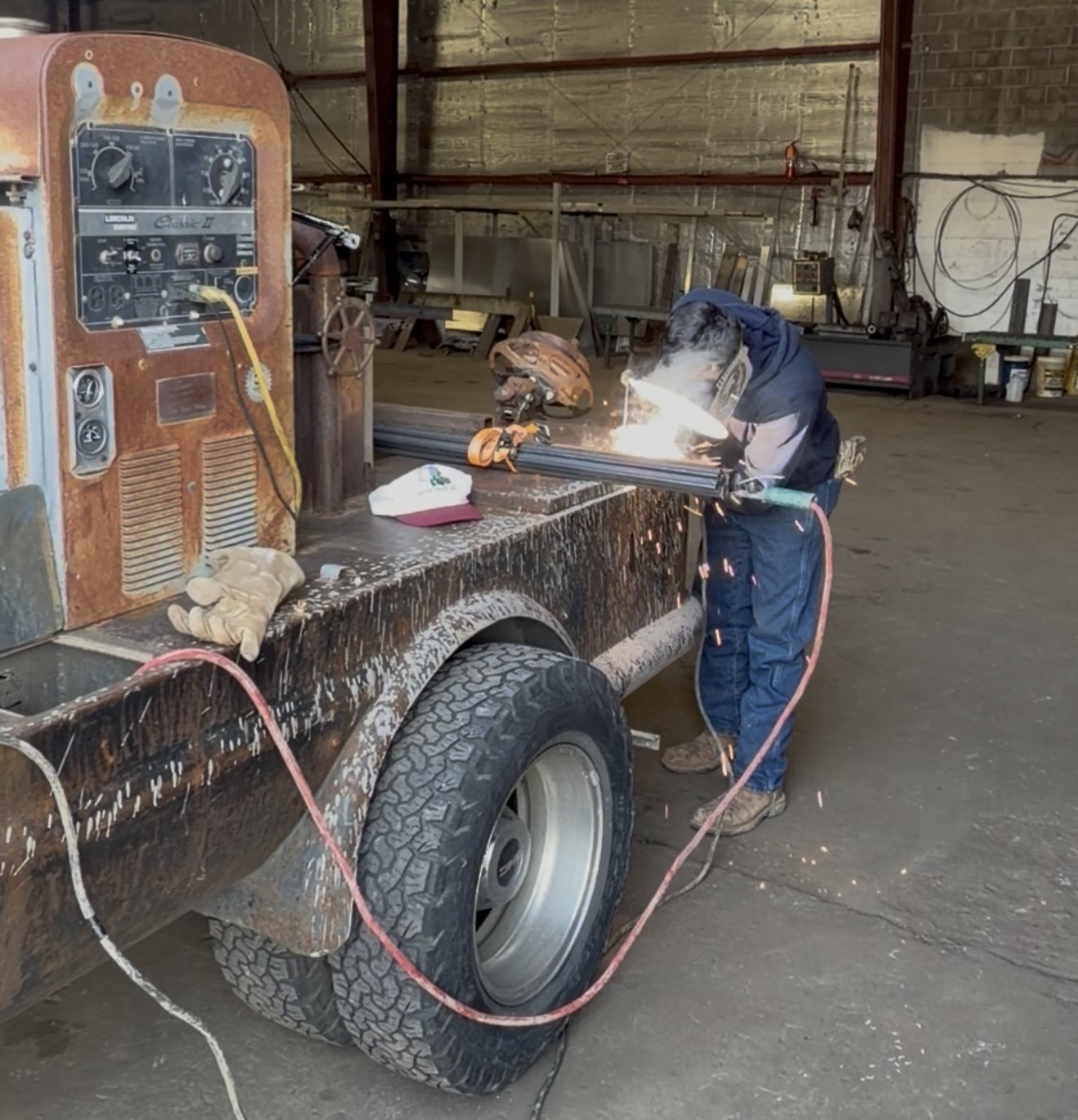 Bullet Iron welder stick welding steel tubing off a Lincoln Classic II welding truck