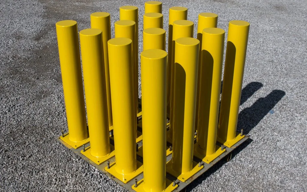 Yellow steel bollards for Birmingham Alabama contractor and property protection jobs